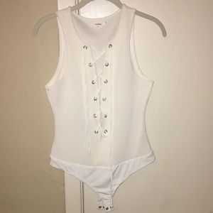 Tula Rosa white bodysuit